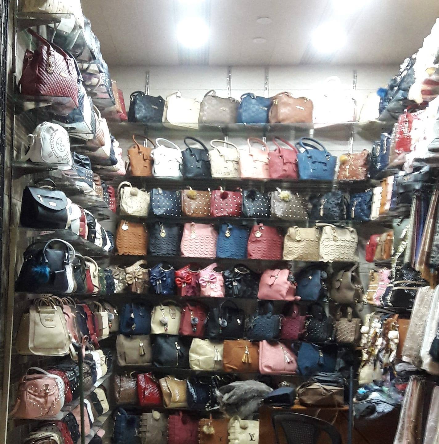 حقائب وشالات الحاج حامد logo